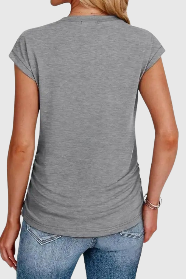 Comfortable women's ruched tunic top with short sleeves. Ideal for relaxed everyday style and summer fashion.