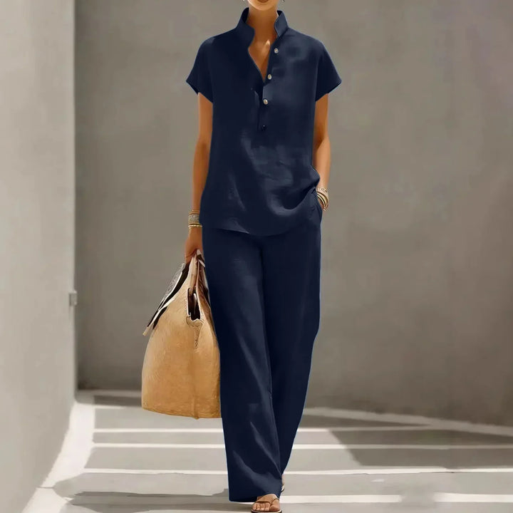 Stylish women's short sleeve two-piece lounge set with matching top & relaxed fit pants, perfect for comfort.