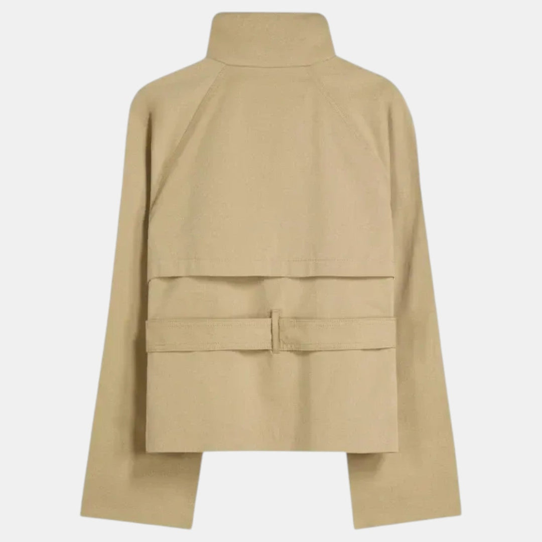 Chic women's short trench coat with an adjustable belt. A versatile lightweight jacket for modern work or casual style.