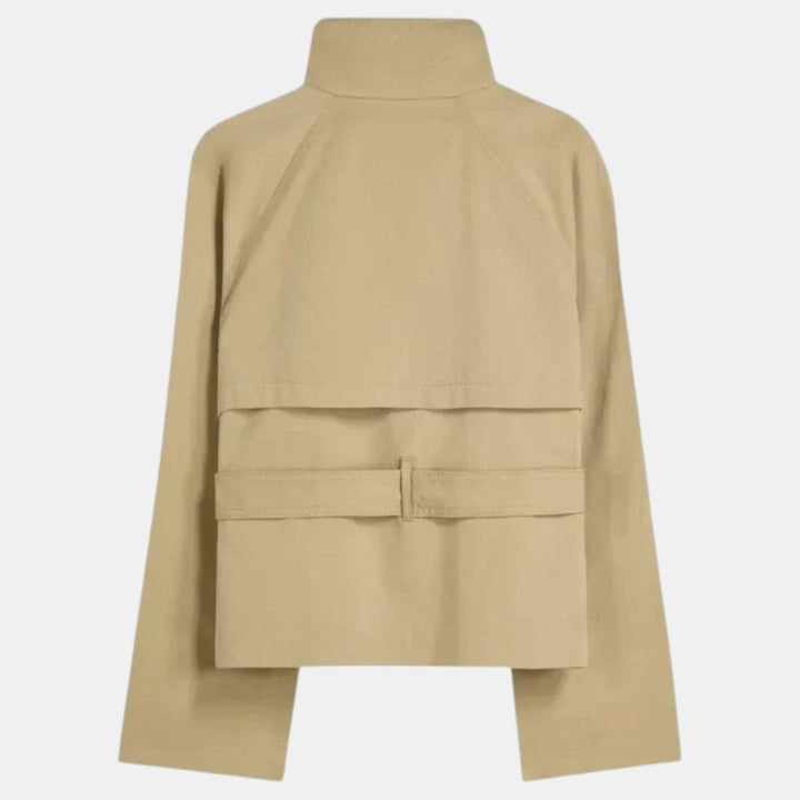 Chic women's short trench coat with an adjustable belt. A versatile lightweight jacket for modern work or casual style.
