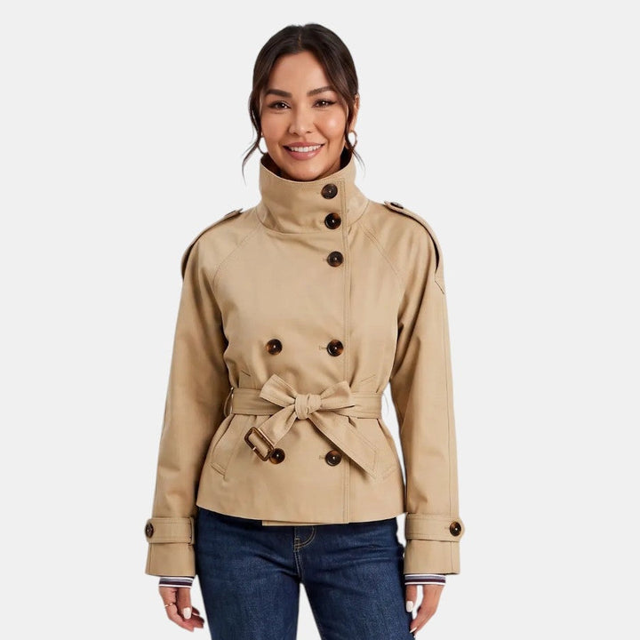 Lightweight women's short trench coat, ideal for spring & fall. Features an adjustable belt for a comfortable, versatile fit.