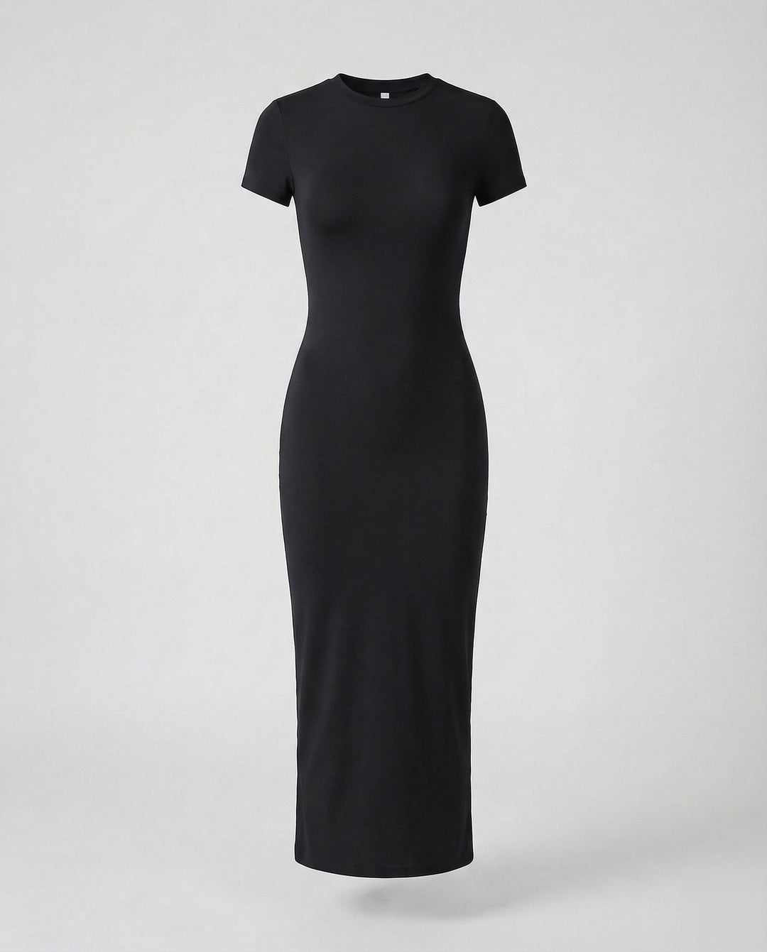 Figure-hugging women's bodycon maxi dress, short sleeve & crew neck, offering a sleek, modern silhouette.