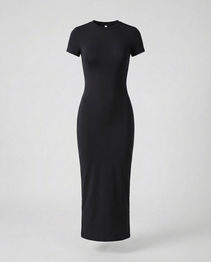 Figure-hugging women's bodycon maxi dress, short sleeve & crew neck, offering a sleek, modern silhouette.