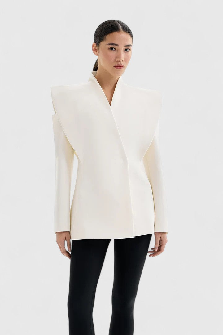 Women's sleek ivory tailored blazer with structured shoulders, perfect for professional or elegant wear.