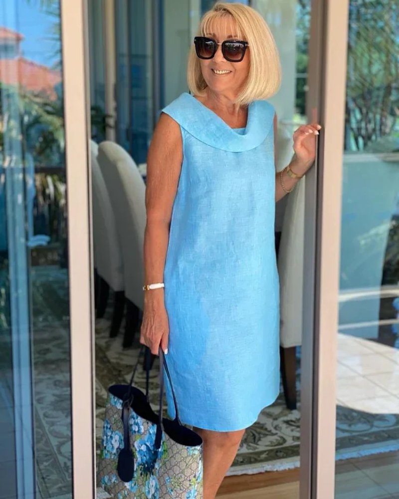 Chic women's cowl neck shift dress, perfect for brunch, vacations, or everyday casual style. Features convenient pockets.