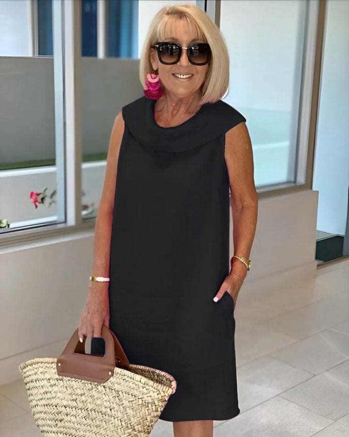 Effortless women's casual shift dress with a stylish cowl neck and practical pockets for relaxed everyday wear.