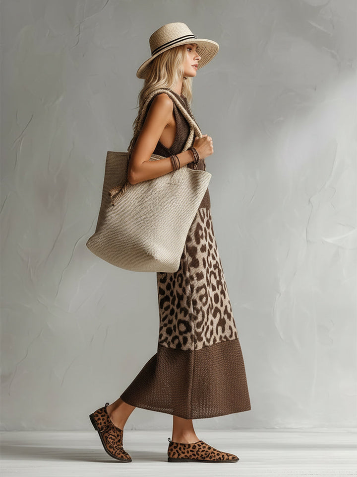 Stylish women's sleeveless leopard print midi dress in brown, a versatile and trendy outfit for casual and chic occasions.