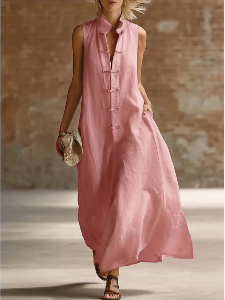 Elegant women's sleeveless maxi shirt dress with buttons & collar, ideal for vacation & travel.