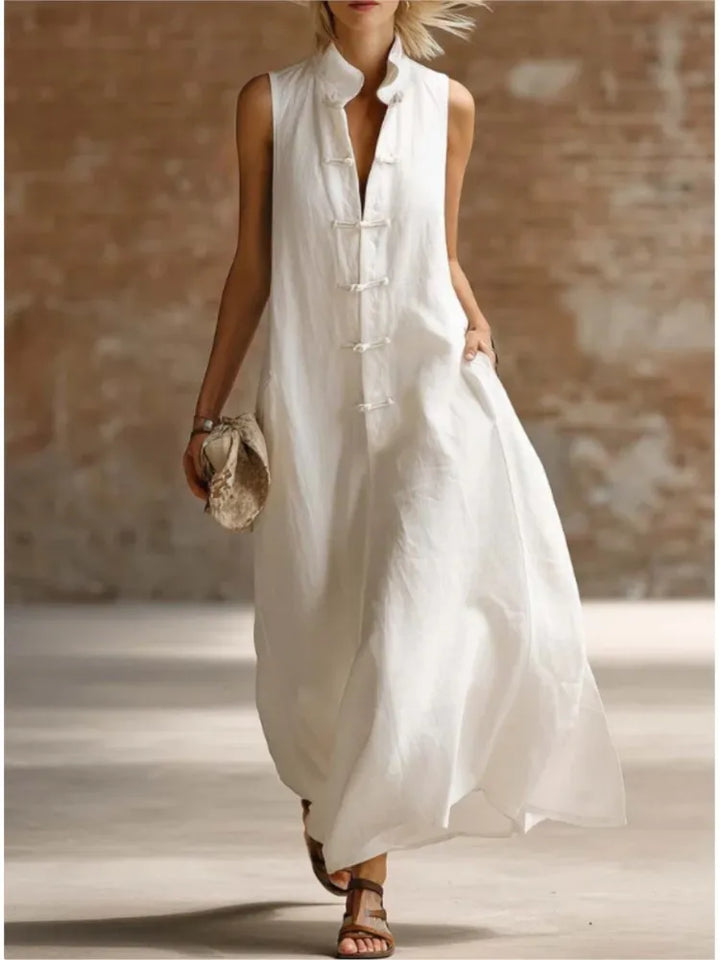 Flowy women's sleeveless maxi shirt dress with a relaxed fit, great for comfortable, chic summer days.
