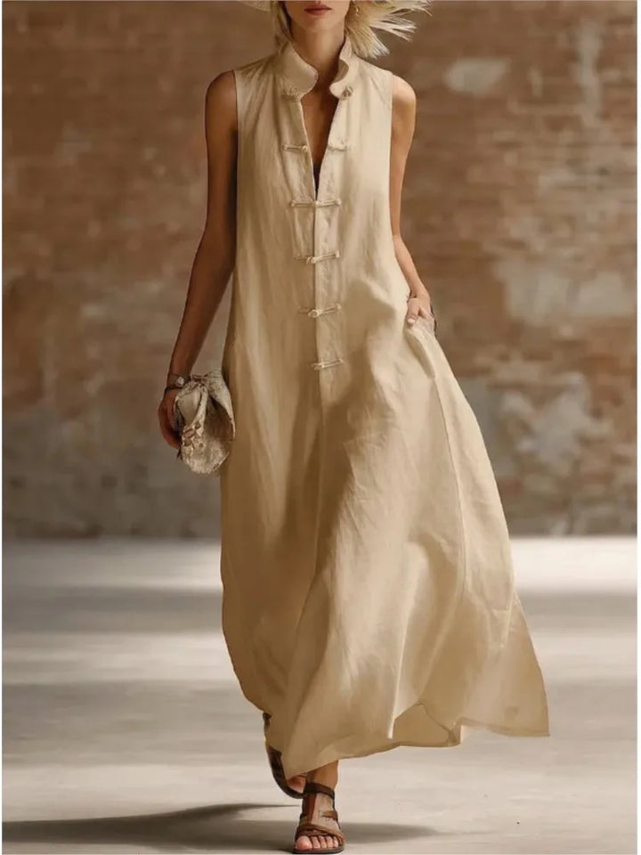 Comfortable women's sleeveless maxi shirt dress with full button front, perfect for relaxed summer style.