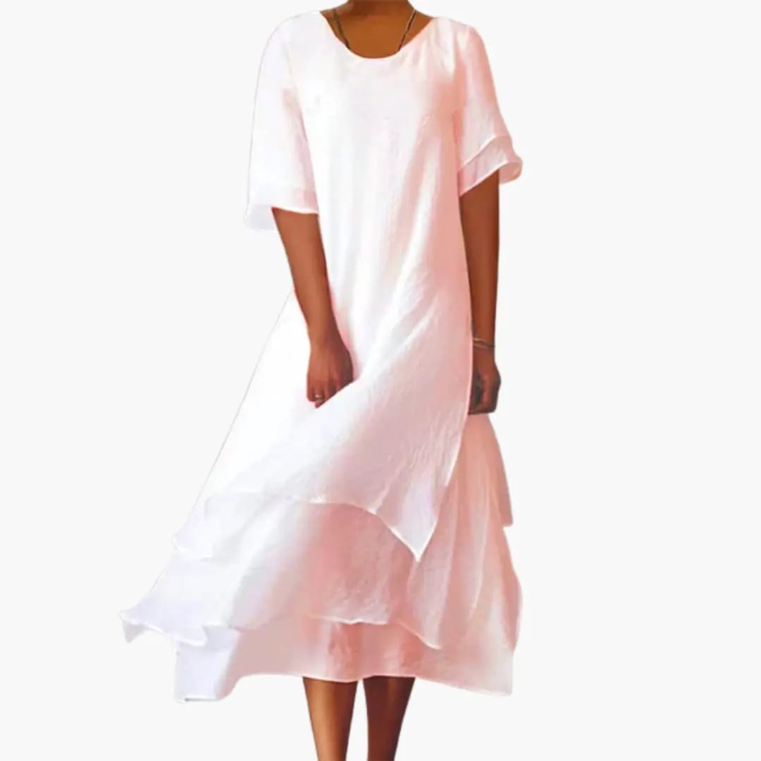 Elegant women's sleeveless midi dress featuring a classic round neck & flattering fitted waist. Summer style.