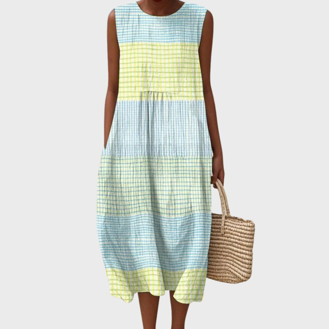 Women's sleeveless patchwork midi dress with a relaxed fit and unique bubble hem, perfect for casual summer wear.