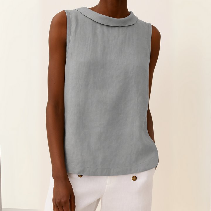 Women's sleeveless round neck blouse, elegant & versatile for summer. Perfect for casual or office wear.