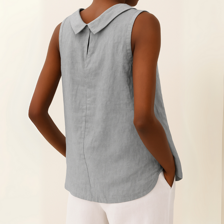 Chic women's sleeveless top with a round neck. Relaxed fit blouse, ideal for everyday fashion & comfort.