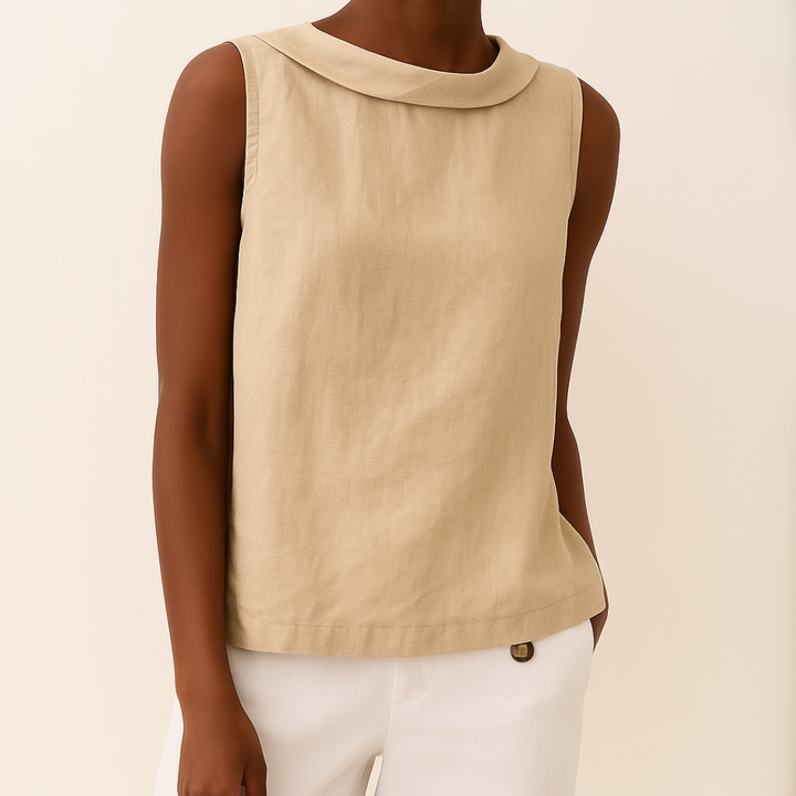 Breezy sleeveless round neck blouse for women, essential summer wear. Comfortable & stylish for any occasion.