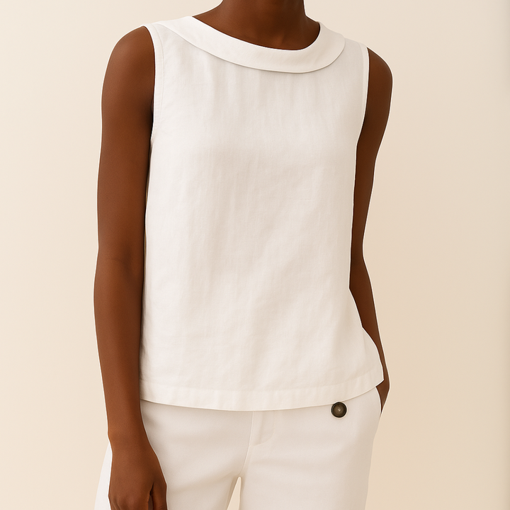 Stylish women's sleeveless top, round neck. An elegant blouse perfect for warm weather and everyday fashion.