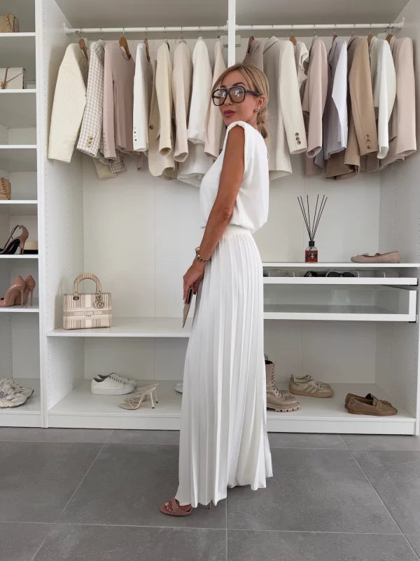 Comfortable women's sleeveless top and wide leg pants set, ideal for elegant loungewear or casual wear.