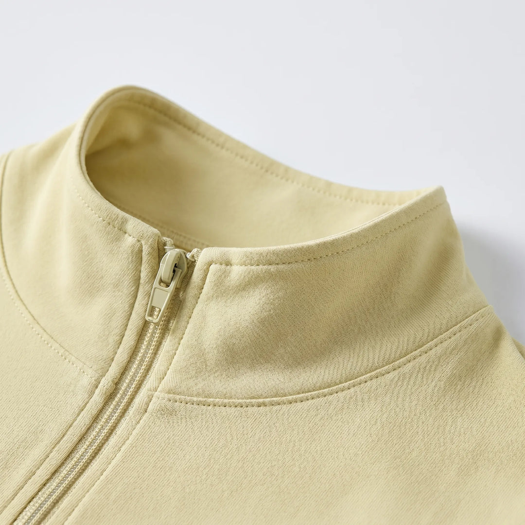 Slim-fit athletic jacket for women, designed for comfort during fitness activities.