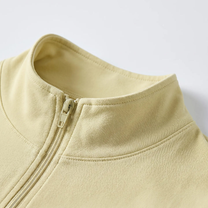 Slim-fit athletic jacket for women, designed for comfort during fitness activities.