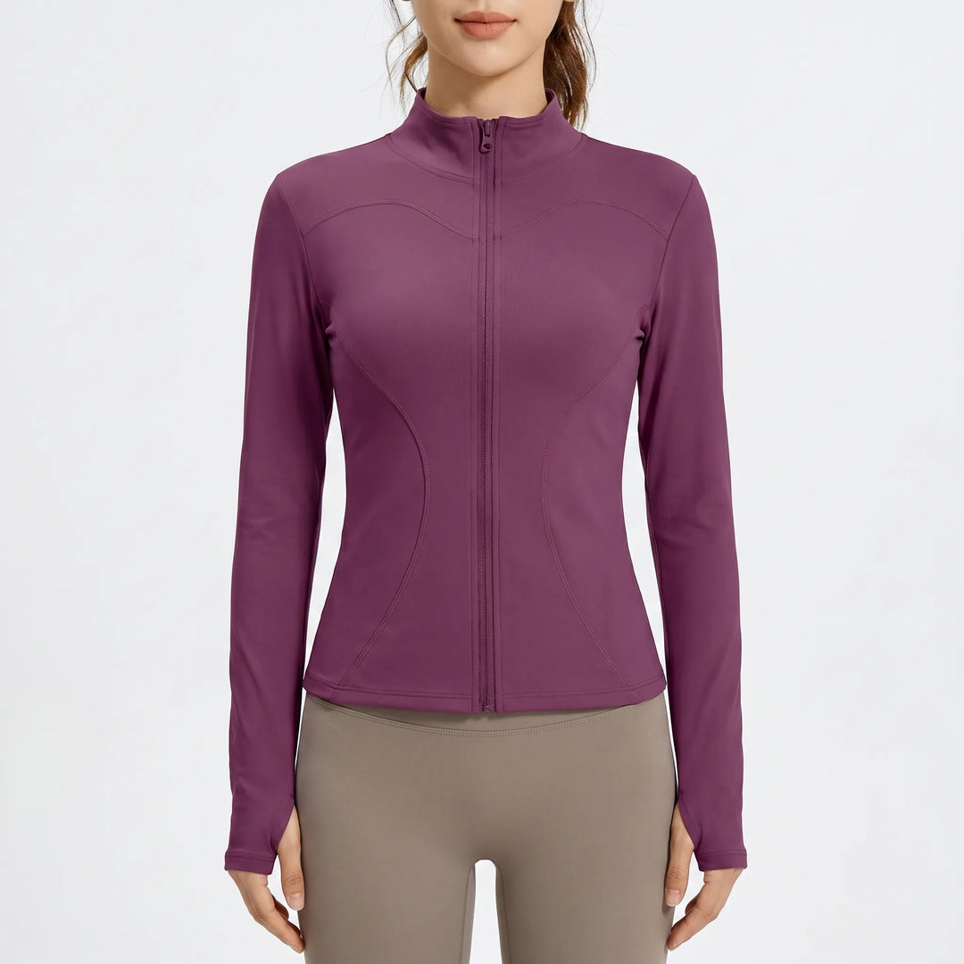 Fitted activewear jacket for women, great for workouts, yoga, and athletic pursuits.