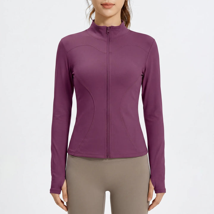 Fitted activewear jacket for women, great for workouts, yoga, and athletic pursuits.