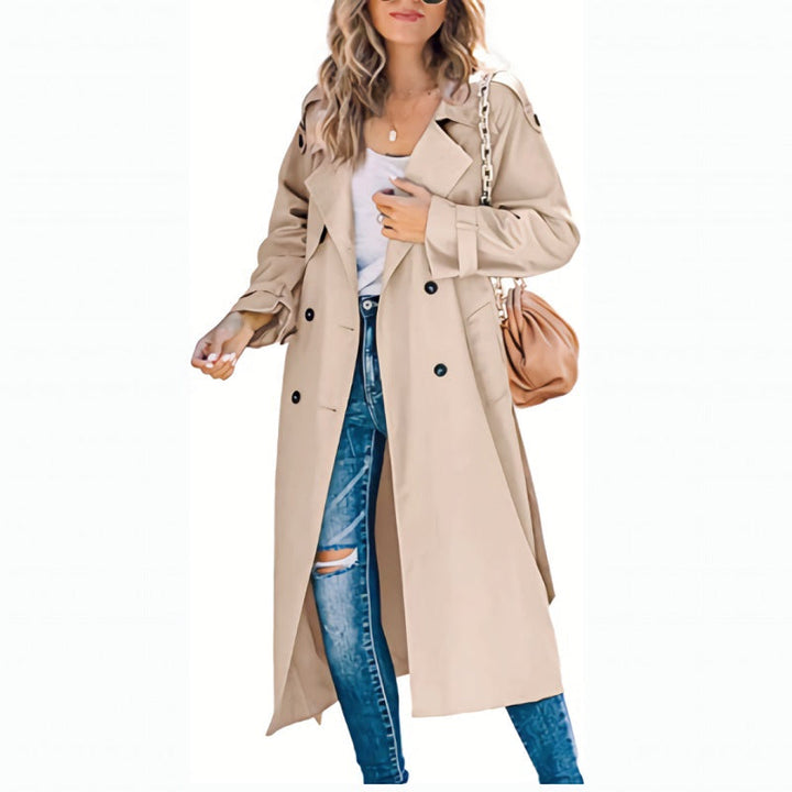 Elegant women's slim fit trench coat with a chic belt, essential outerwear for a modern autumn look.