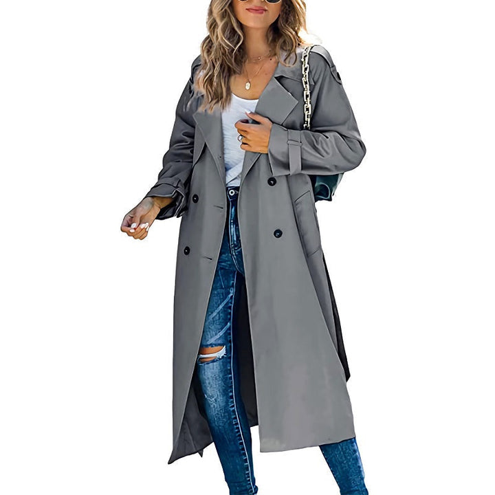 Classic women's belted trench coat, offering a timeless and modern slim fit silhouette for spring.