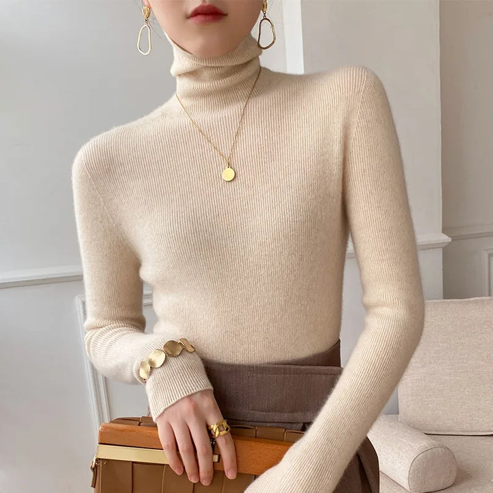 Women's slim fit turtleneck sweater, perfect for effortless layering in fall & winter fashion.