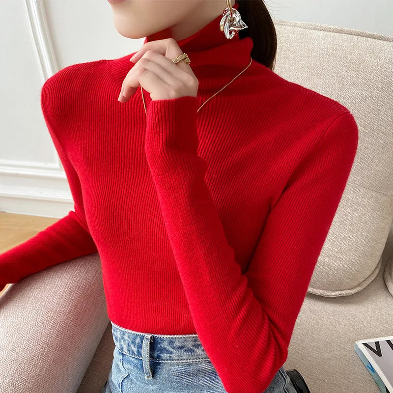 Stylish women's turtleneck sweater, designed with a slim fit for chic layering in any fall or winter ensemble.