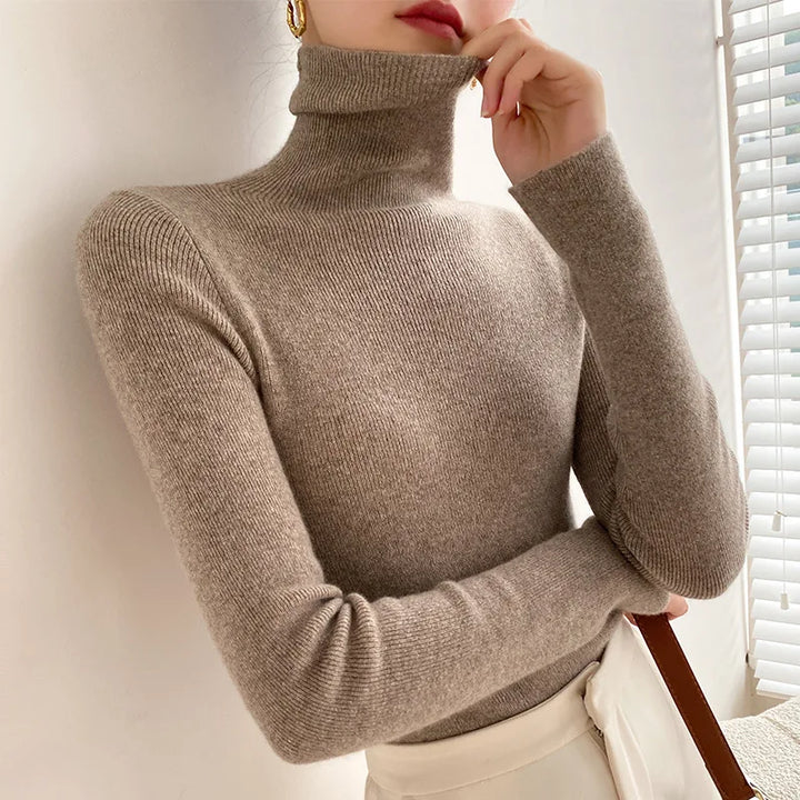 Versatile women's slim fit long sleeve turtleneck sweater, essential for cozy and chic fall & winter layering.