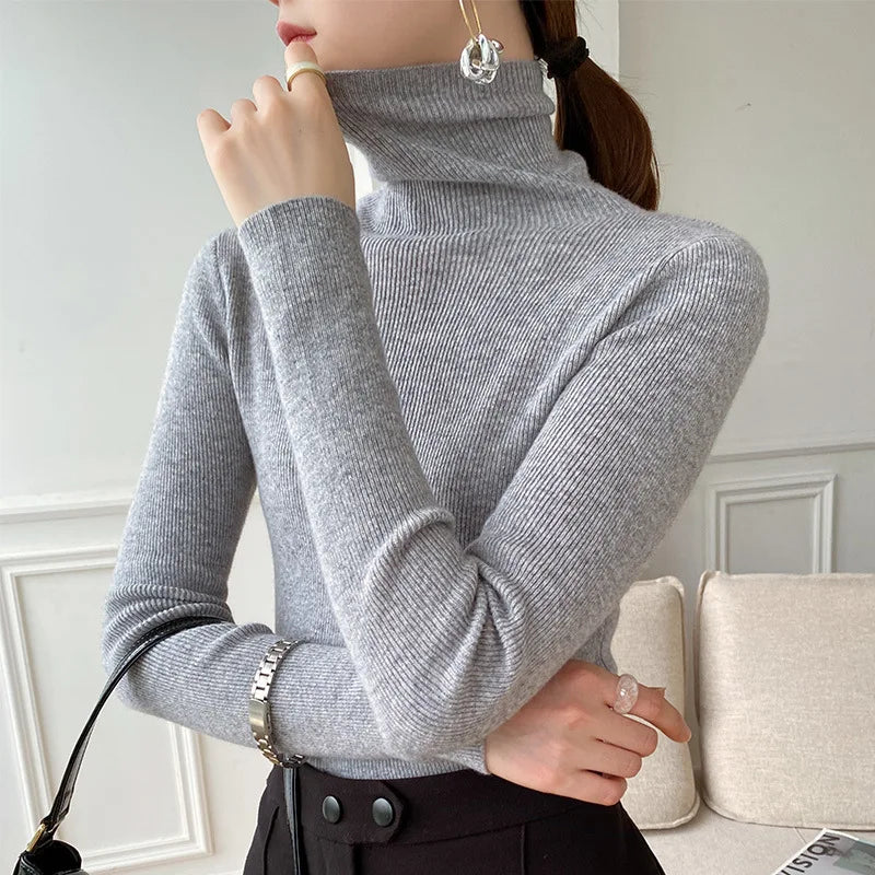 Sophisticated women's knit turtleneck sweater, offering a flattering slim fit for elegant layering. Perfect for winter.