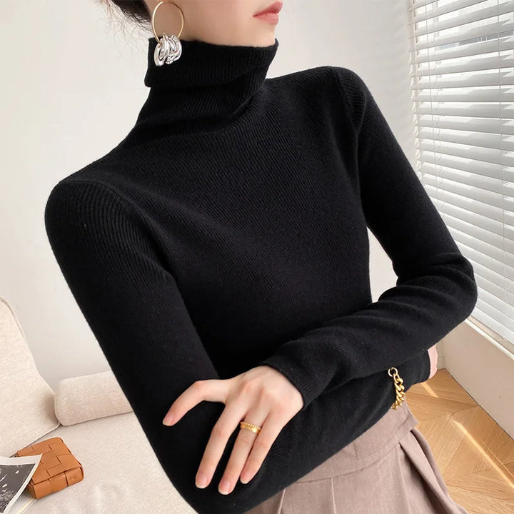 Effortless women's slim fit turtleneck sweater, a cozy long sleeve top for versatile fall and winter fashion.