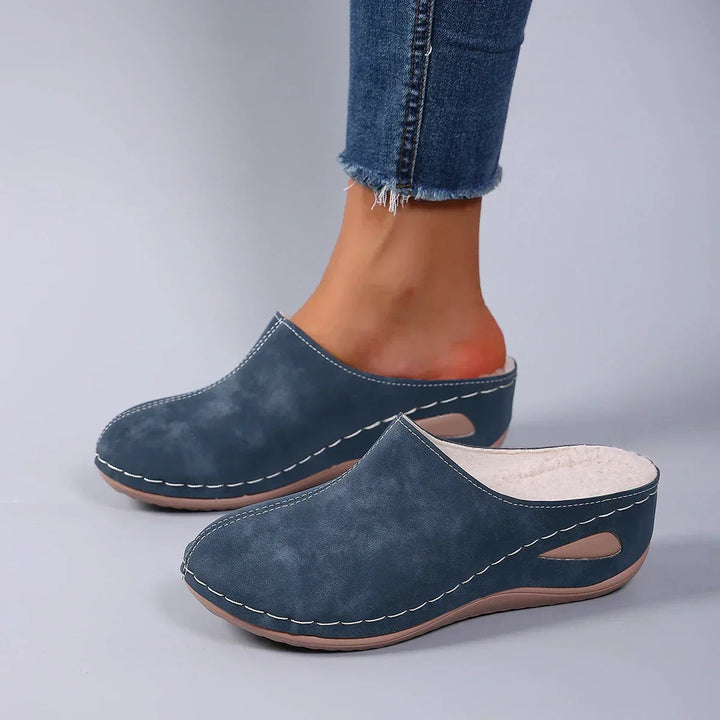 Stylish women's comfort clogs with soft cushioning for ultimate all-day wear. Easy slip-on design.