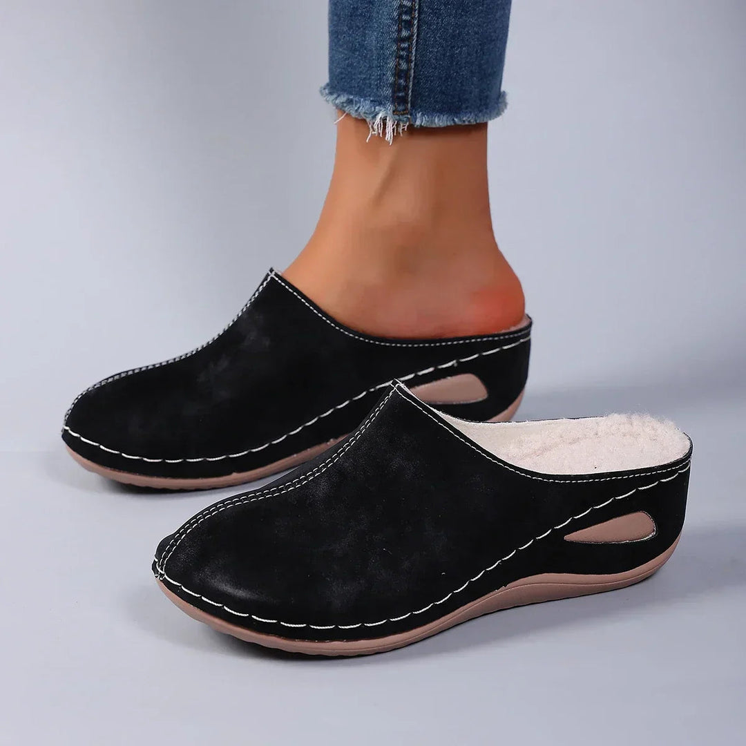 Lightweight women's comfort clogs, perfect for everyday casual wear. Cushioned slip-on footwear.