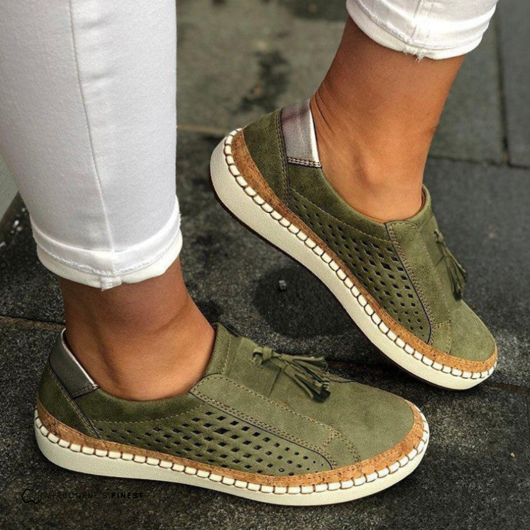 Red women's perforated espadrille loafers with tassels. Perfect summer slip-on flats for casual wear.