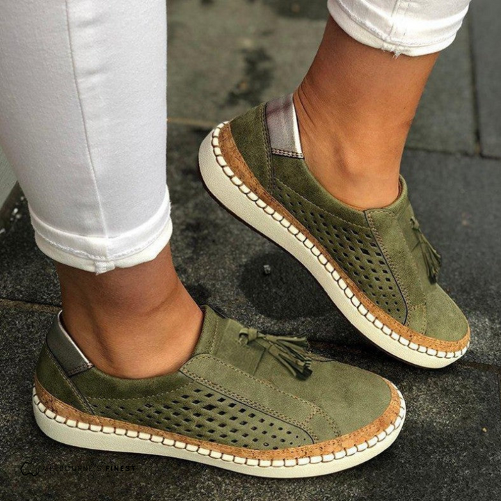 Red women's perforated espadrille loafers with tassels. Perfect summer slip-on flats for casual wear.