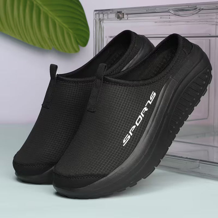 Supportive women's slip-on orthopedic slippers, ideal for indoor use. Cushioned comfort footwear with arch.