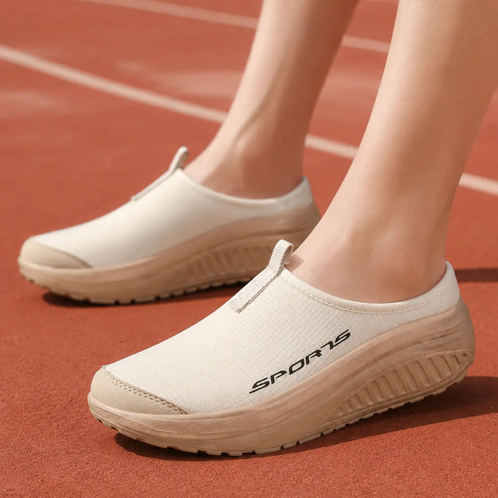 Women's orthopedic slip-on slippers, designed for ultimate comfort. Cushioned, supportive indoor footwear.