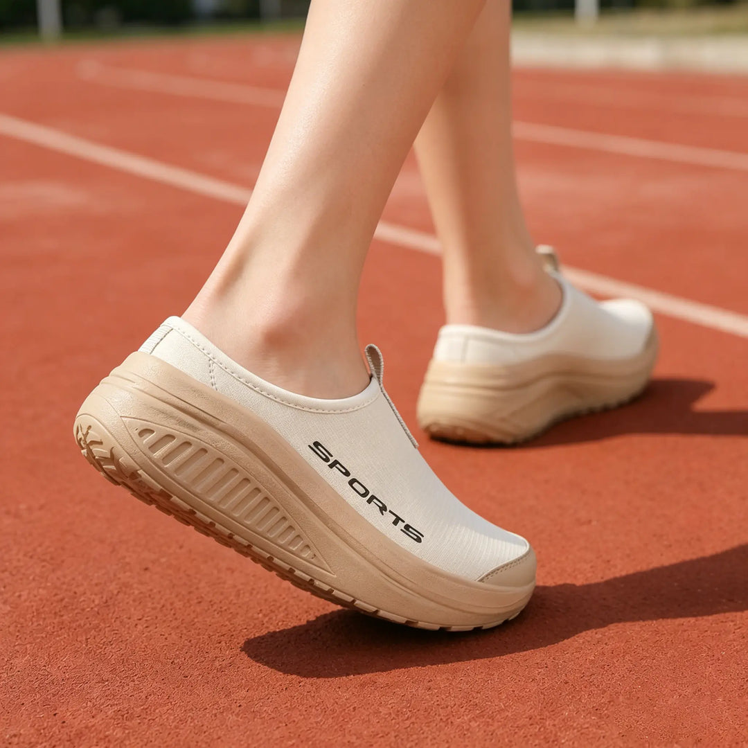 Ultimate comfort women's slip-on orthopedic slippers with cushioned soles & arch support for house wear.