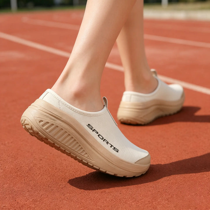Ultimate comfort women's slip-on orthopedic slippers with cushioned soles & arch support for house wear.