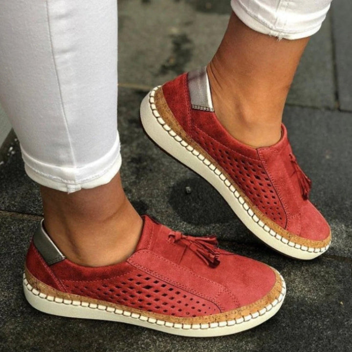 Versatile women's slip-on sneakers for walking, featuring breathable mesh & cushioned sole for all-day comfort.