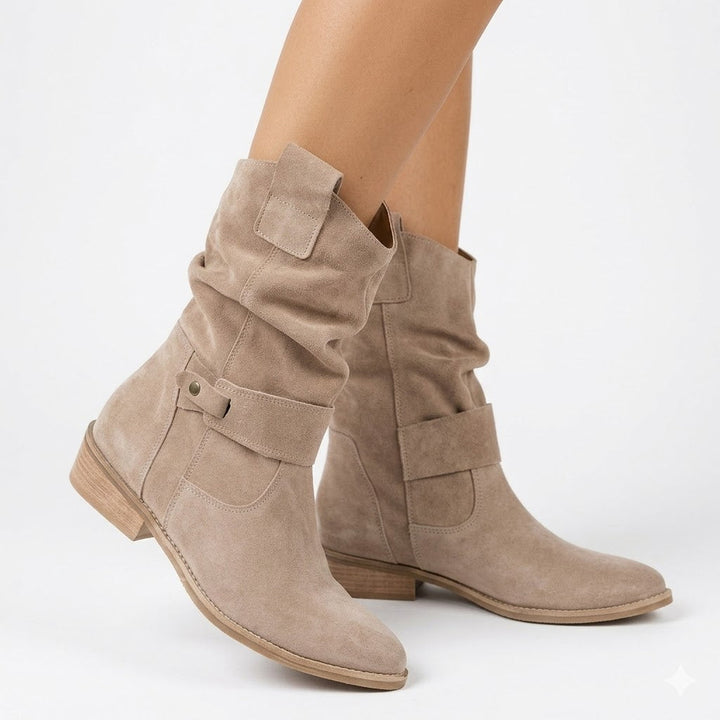 Women's slouchy ankle boots with a comfortable low heel and stylish buckle strap, perfect for fall casual wear.