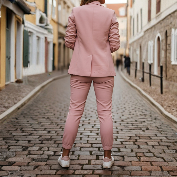 Comfortable women's two-piece ruched sleeve blazer & jogger set. Ideal for professional or loungewear.
