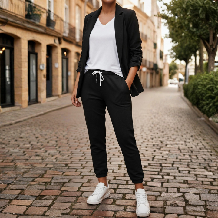 Versatile women's ruched sleeve blazer & jogger set. Ideal for professional style, comfort, or loungewear.
