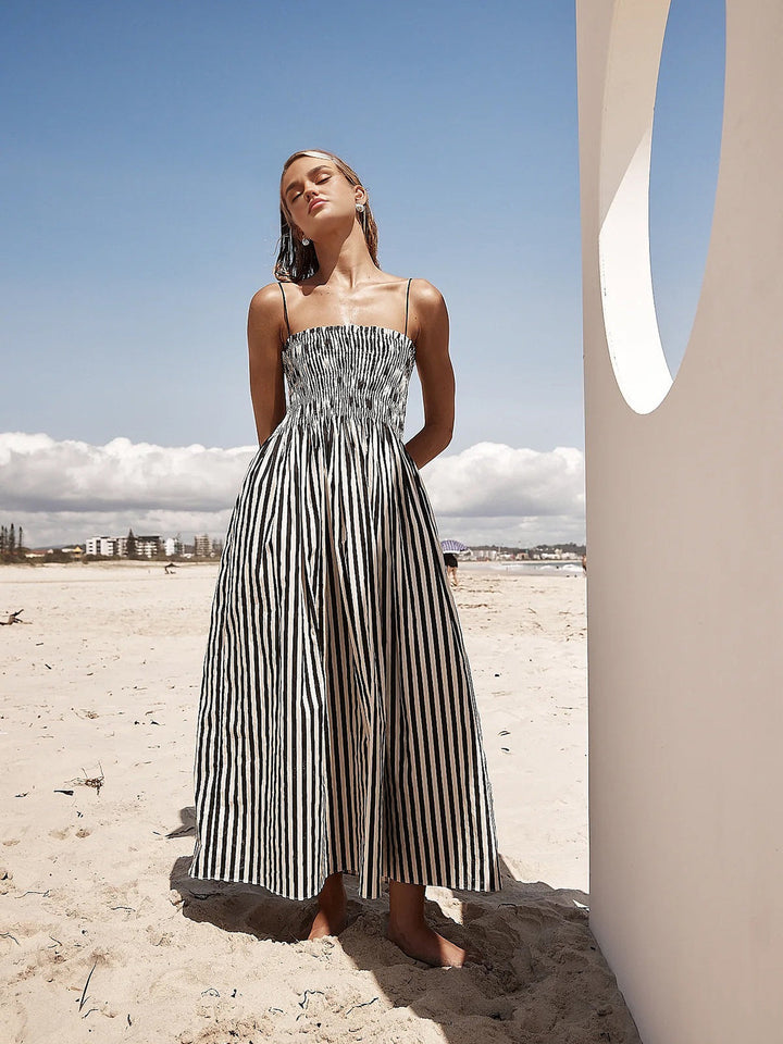 Comfortable smocked bodice women's pinstripe maxi dress, a relaxed a-line casual summer dress.