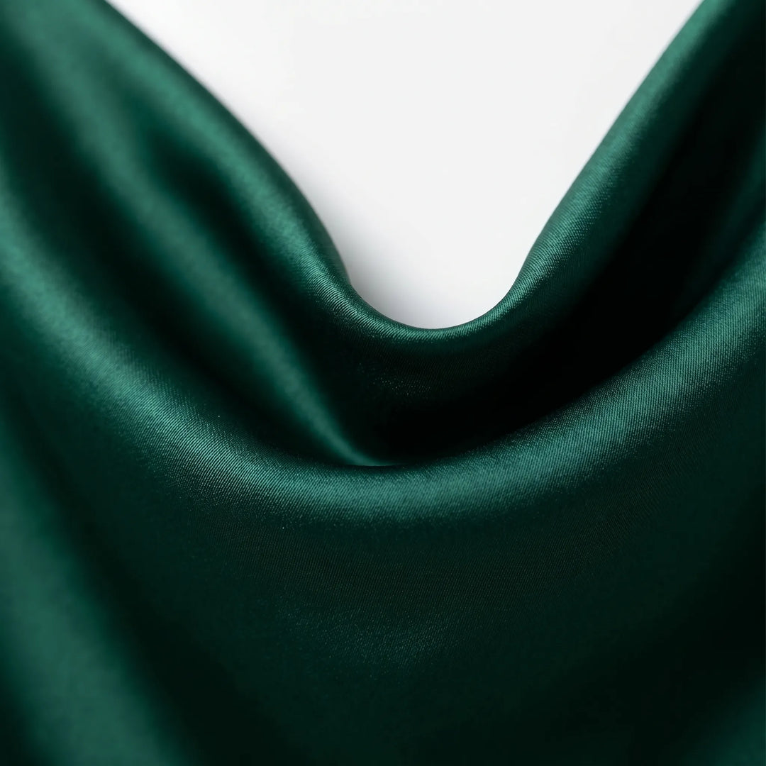 Elegant women's sleeveless camisole with draped neckline. Ideal smart casual top for summer and stylish layering.