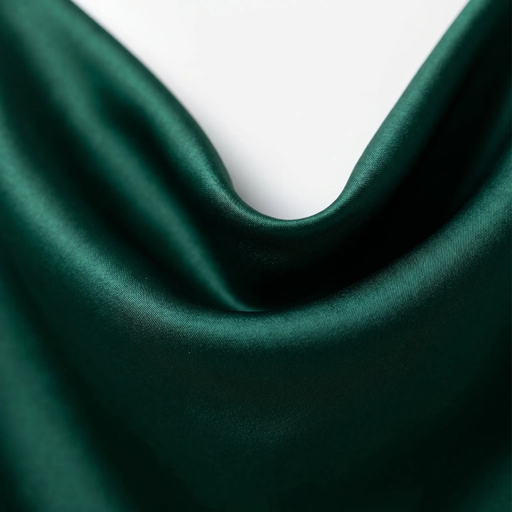 Elegant women's sleeveless camisole with draped neckline. Ideal smart casual top for summer and stylish layering.