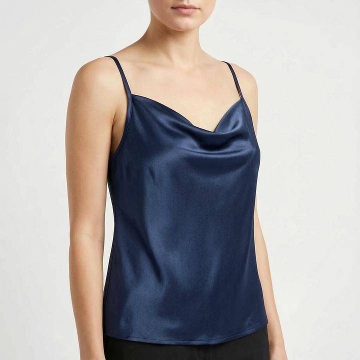 Stylish women's draped camisole with adjustable straps. Versatile sleeveless top for elegant everyday or casual wear.