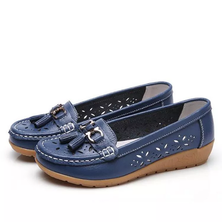 Stylish women's slip-on moccasin sandals with a breathable design, arch support, and comfortable fit.