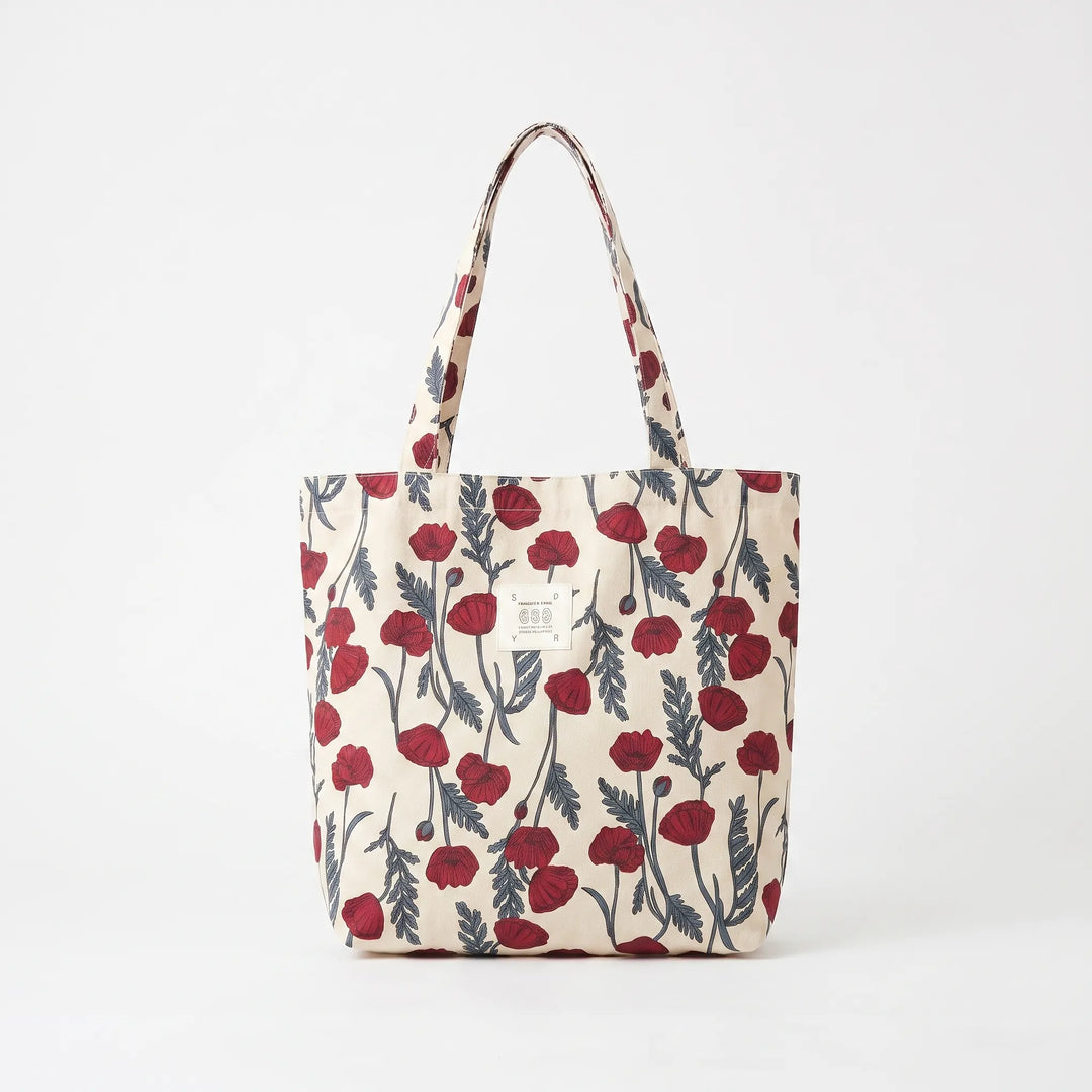 Spacious women's printed tote bag, a large shoulder accessory with colorful floral design for daily essentials.